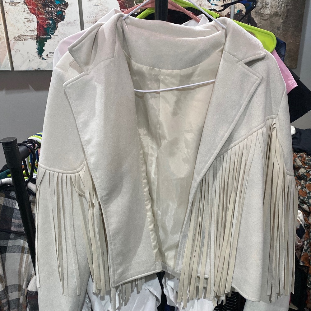 Fringe off white jacket.